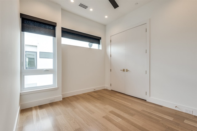 entryway featuring light wood-type flooring and ceiling fan