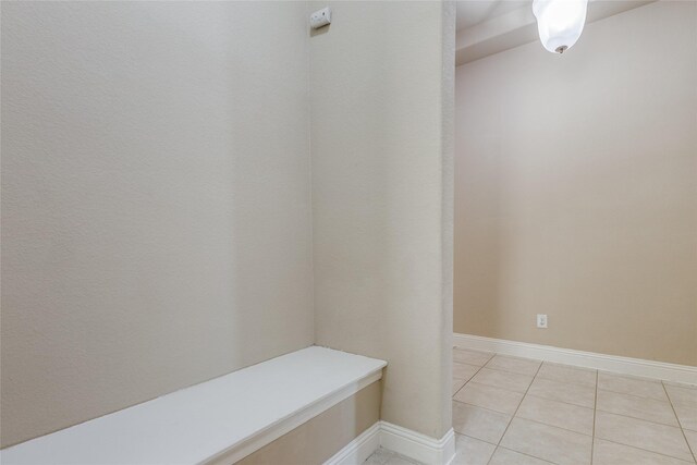 mudroom with light tile patterned floors