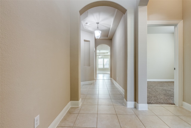 hallway featuring light tile patterned flooring