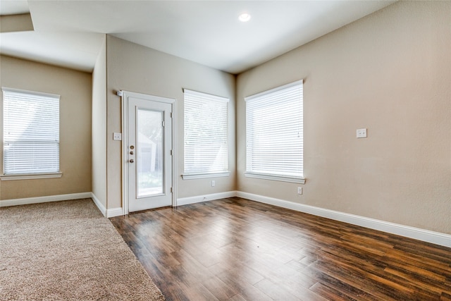 doorway to outside featuring dark hardwood / wood-style flooring