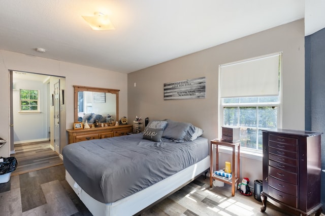 bedroom featuring hardwood / wood-style floors