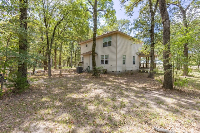 view of property exterior featuring central AC