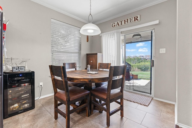 9433 Drovers View Trl, Fort Worth, TX 76131 - dining area featuring baseboards, light tile patterned floors, crown molding, and wine cooler