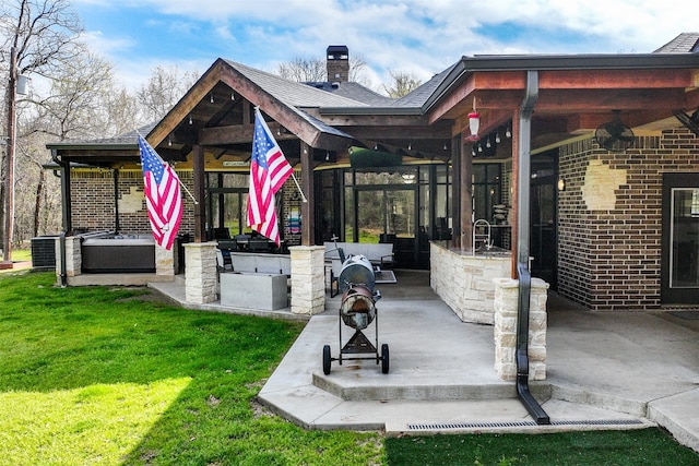 view of patio / terrace with an outdoor living space and ceiling fan