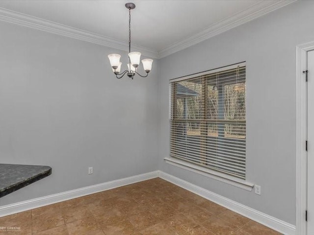 unfurnished dining area featuring ornamental molding and a chandelier