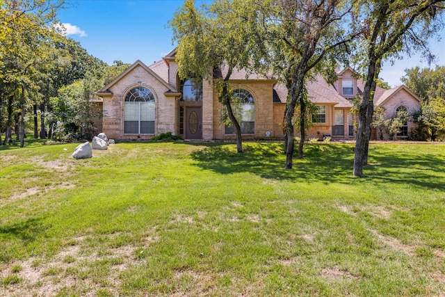 view of front of home with a front yard