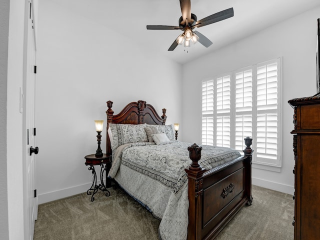 bedroom with light carpet and ceiling fan