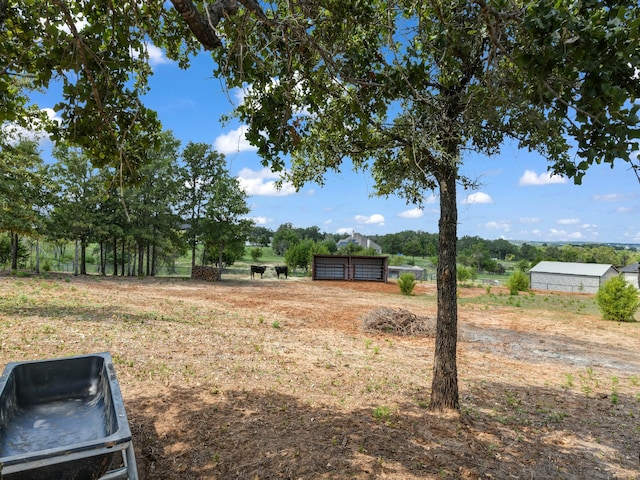 view of yard featuring a mail area