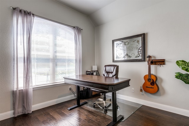 office space featuring vaulted ceiling and dark hardwood / wood-style flooring