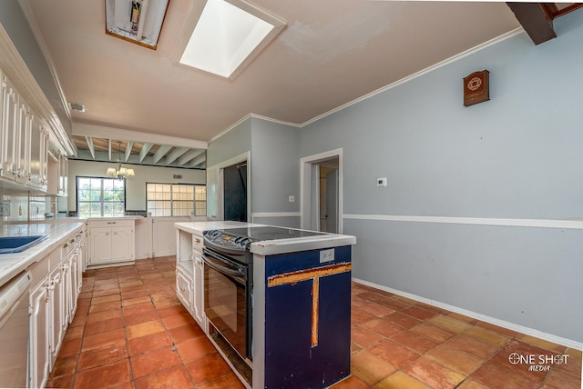 kitchen with ornamental molding, white cabinetry, a center island, and white dishwasher