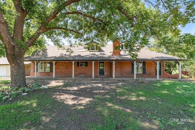 view of front of home with a front lawn and covered porch