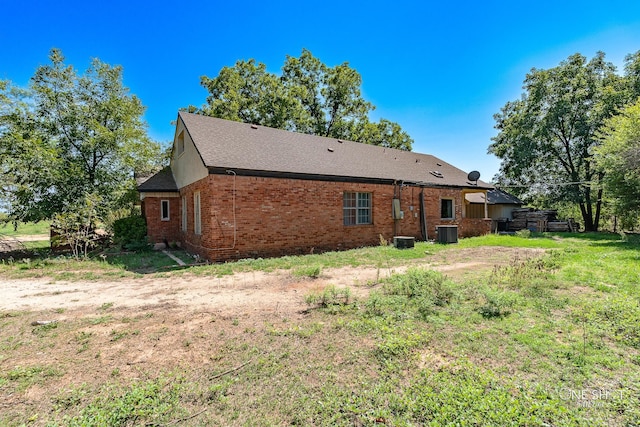 back of property featuring cooling unit