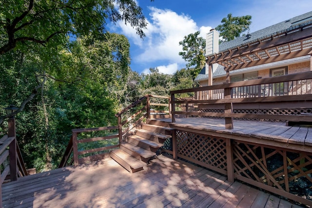 wooden terrace featuring a pergola