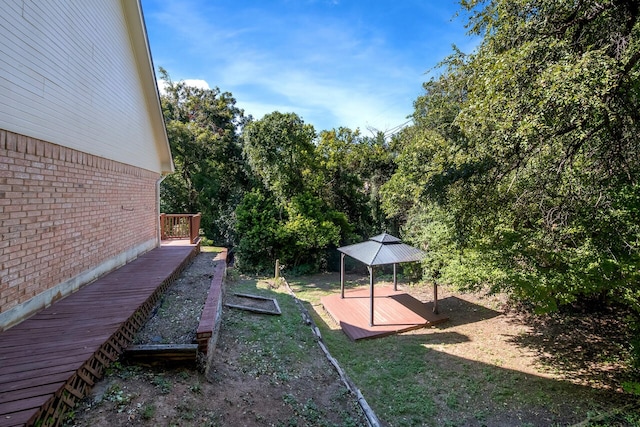 view of yard featuring a deck