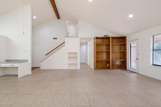 unfurnished living room with high vaulted ceiling, beam ceiling, and light tile patterned flooring