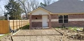 view of front facade with an outbuilding