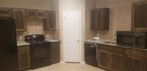 kitchen with black appliances