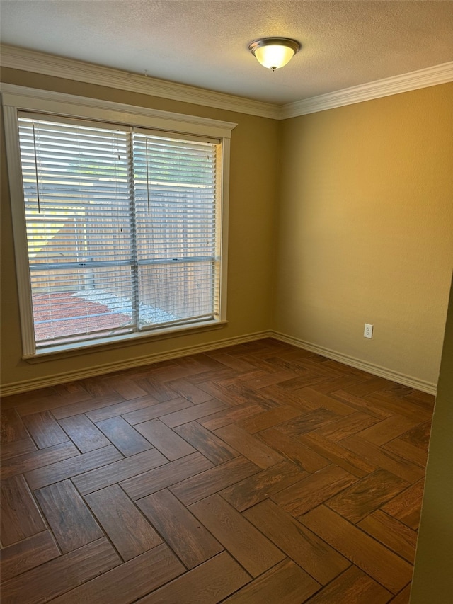 unfurnished room with a textured ceiling, ornamental molding, and dark parquet flooring