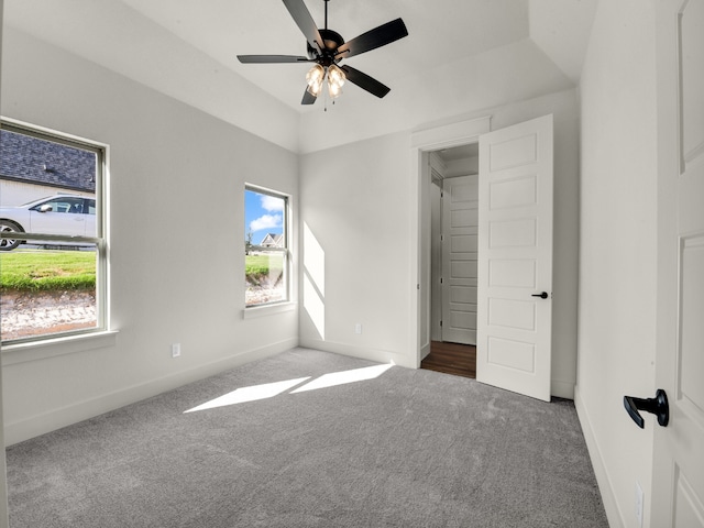 unfurnished bedroom featuring carpet flooring and ceiling fan