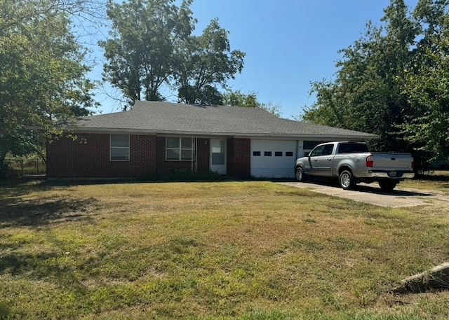 single story home with a front lawn and a garage