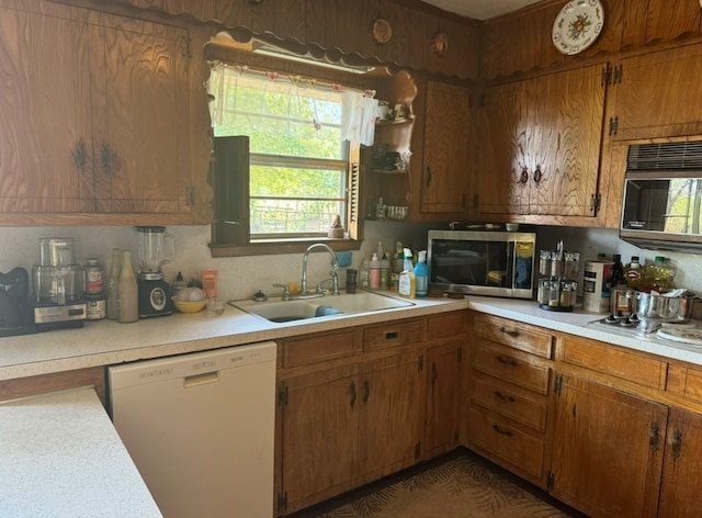 kitchen featuring appliances with stainless steel finishes and sink