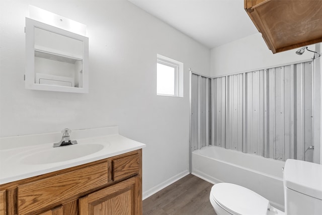 full bathroom featuring vanity, toilet, wood-type flooring, and shower / tub combo