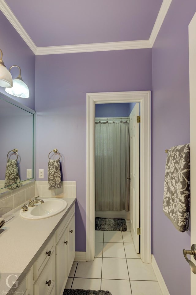 5725 S Lakeshore Dr, Shreveport, LA 71119 - full bath with vanity, ornamental molding, tile patterned flooring, a shower with shower curtain, and baseboards