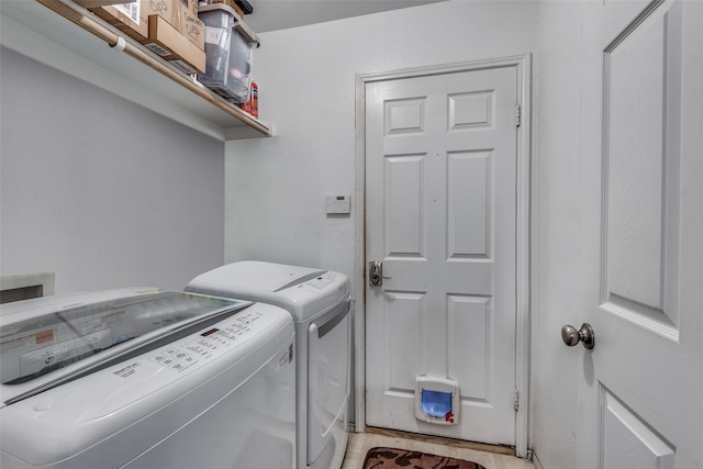 laundry area with washer and clothes dryer