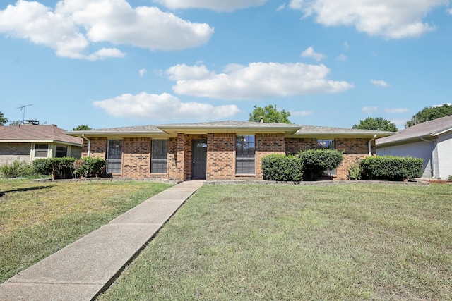 single story home with a front yard