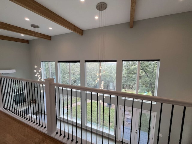 corridor featuring beamed ceiling and hardwood / wood-style flooring