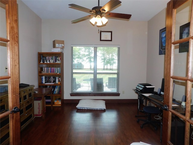 office area with ceiling fan and dark hardwood / wood-style floors