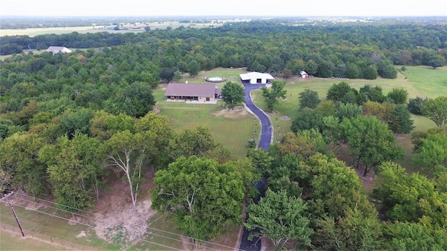 birds eye view of property with a rural view