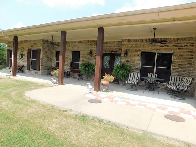 view of patio / terrace featuring ceiling fan