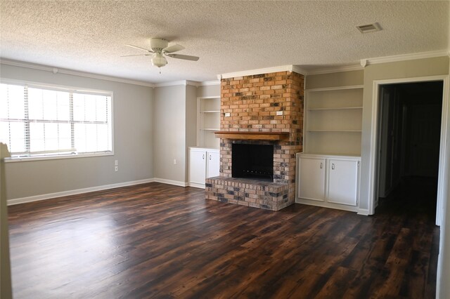 kitchen featuring a textured ceiling, appliances with stainless steel finishes, light tile patterned floors, and sink