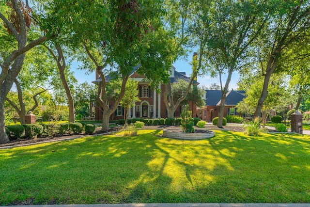 view of front of home with a front yard