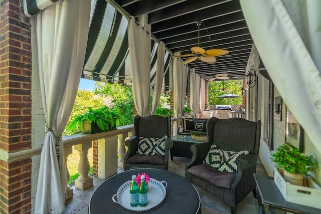 sunroom / solarium with ceiling fan