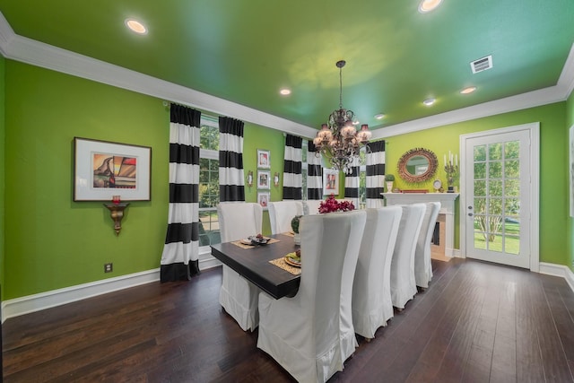 bedroom with a chandelier, dark hardwood / wood-style floors, and ornamental molding