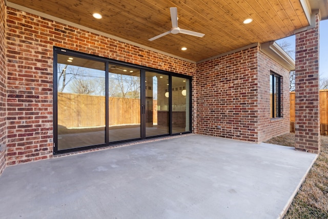 view of patio / terrace featuring ceiling fan