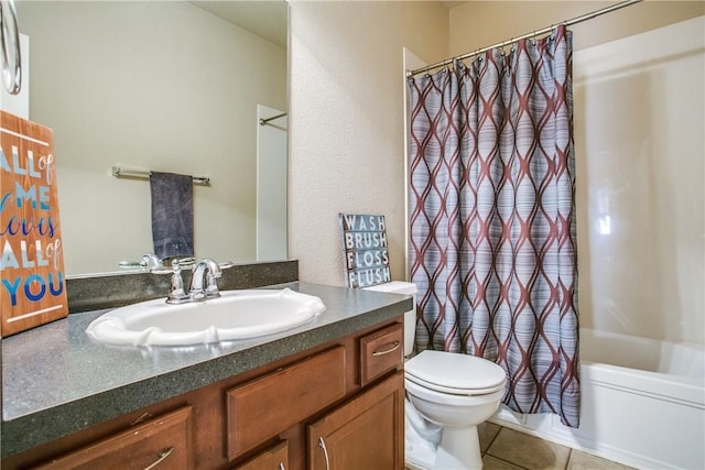 full bathroom featuring shower / bath combo with shower curtain, tile patterned flooring, vanity, and toilet