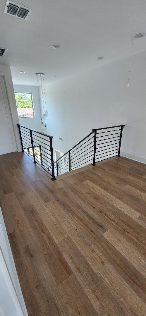 3338 Sylvan Ave, Dallas, TX 75212 - stairway with wood finished floors