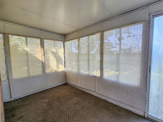 view of unfurnished sunroom