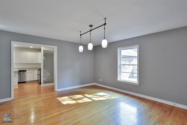 empty room featuring light hardwood / wood-style floors