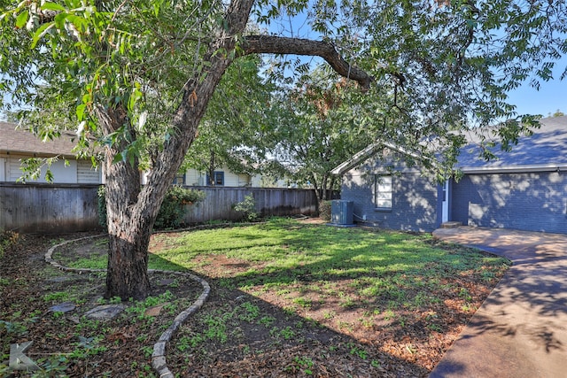 view of yard featuring central AC