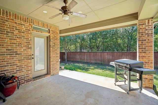 view of patio / terrace featuring ceiling fan and a grill