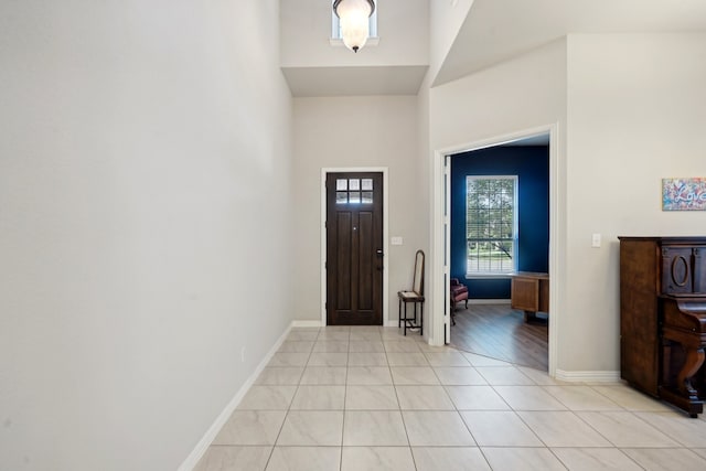 entrance foyer with light tile patterned flooring