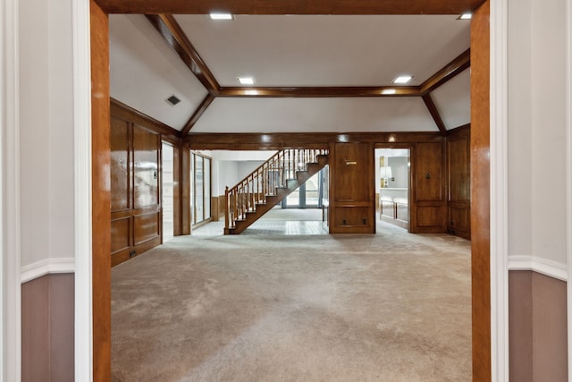 interior space with lofted ceiling with beams