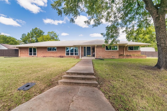 ranch-style house with a front yard