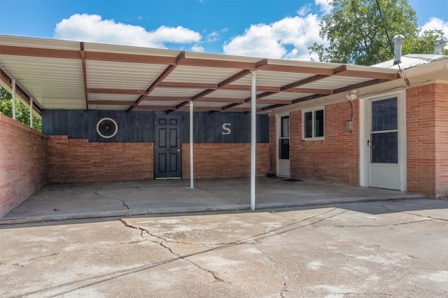 view of patio featuring a carport