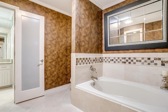 bathroom with ornamental molding, tile patterned flooring, tiled bath, and vanity