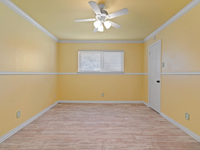 unfurnished room featuring light hardwood / wood-style floors, ceiling fan, and crown molding